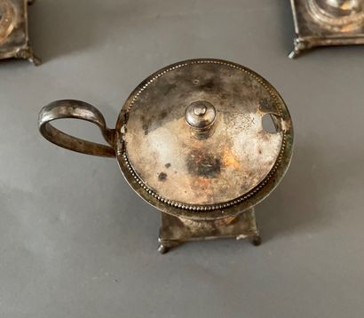 null A pair of double saltcellars and a mustard pot in silver, AB, decorated with...