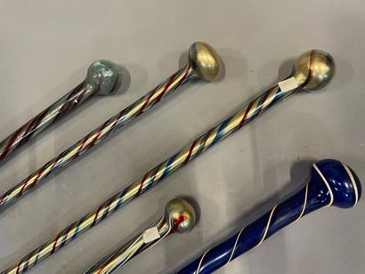  Five polychrome and gold spun glass canes with rounded knobs. 
Venice, early 20th...