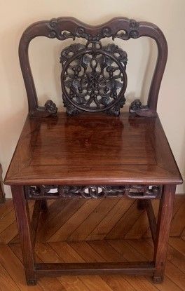 Pair of ironwood chairs with openwork vine...