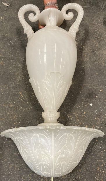 null Pair of wall sconces in alabaster carved with foliage composed of two vases,...
