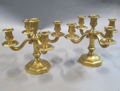 A pair of ormolu torches with five arms of...