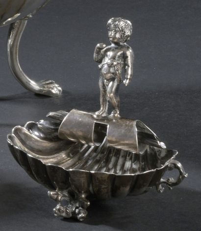 Silver saltcellar, formed by a shell resting...