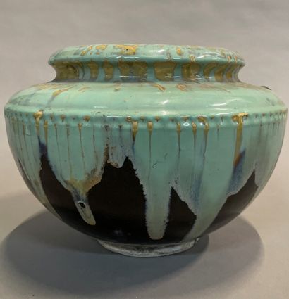 Glazed terracotta pot cover in green and...