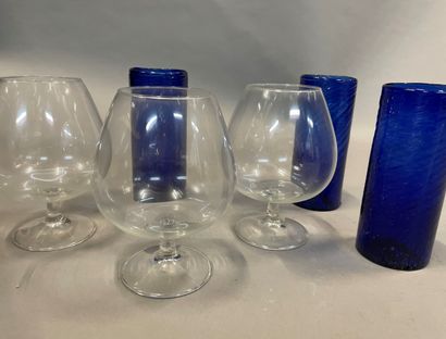  Set of 12 glass cognac glasses and 12 blue bubble glass orangeade glasses.