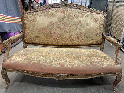 Gilded wood sofa, molded and carved with...