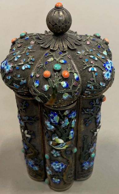 null A silver and niello covered pot with enamelled birds on a metal core.

China...