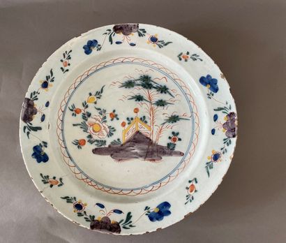 null Delft, 18th century

Three earthenware dishes, one with polychrome decoration...
