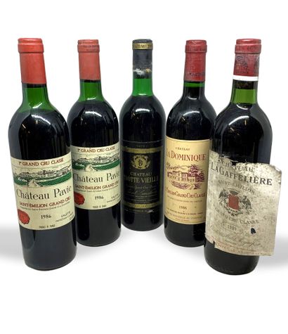  5 bouteilles : 
- 2 Château PAVIE 1er Grand Cru Classé, Saint-Emilion Grand Cru...