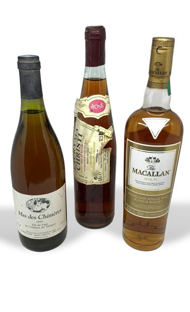 null 9 bouteilles : 

- 1 MACALLAN Gold Highland Single Malt Scotch Whisky 70 cl...