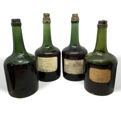  12 bouteilles anciennes non identifiées d'eau de vie : 
- 4 épaulées, avec cachets...