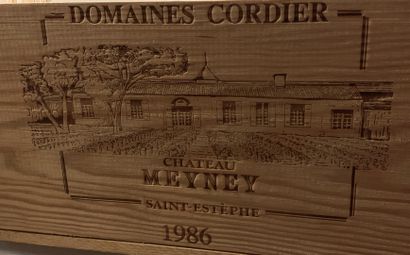 null 7 bouteilles de Château MEYNEY Cru Bourgeois Saint-Estèphe 1986, caisse bois...