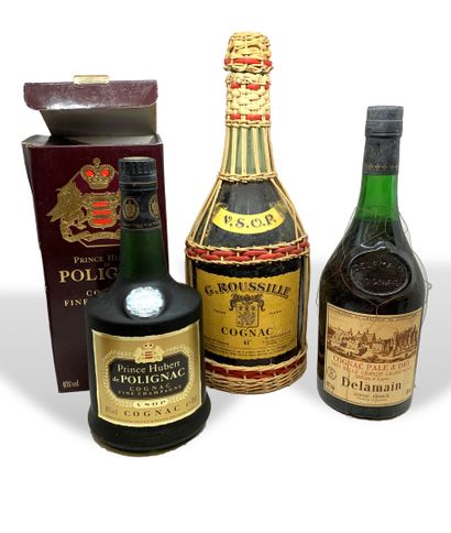  3 bouteilles de COGNAC : 
- 1 VSOP Prince Hubert de Polignac, Fine Champagne, avec...