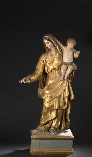 Vierge à l'Enfant en bois sculpté en ronde-bosse,...