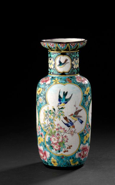 null LONGWY

Polychrome enamelled ceramic scroll vase with a conical neck decorated...