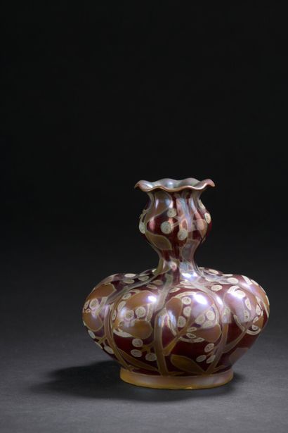 ZSOLNAY

Vase with conical body and swollen...