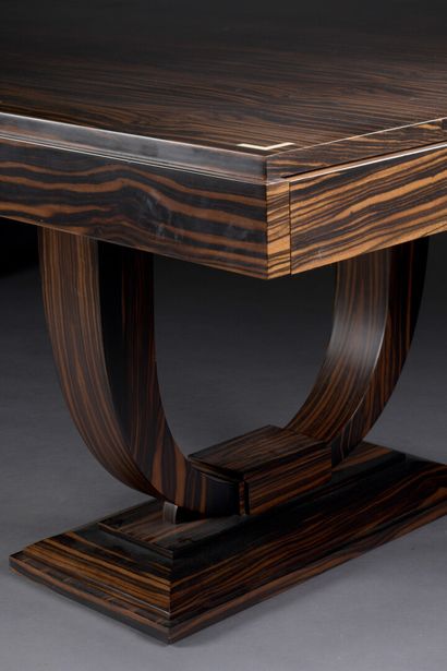 null CONTEMPORARY ART DECO STYLE WORK

A large rosewood veneer dining table with...
