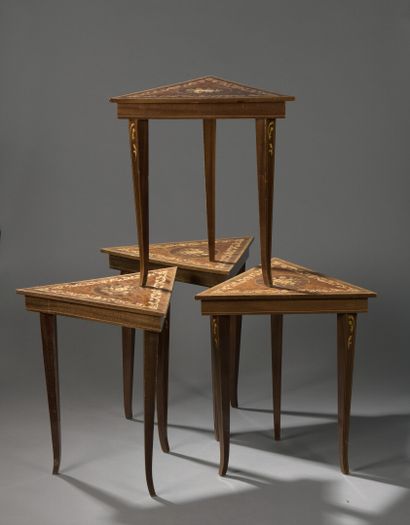 null Four triangular tables, each revealing a music box, opening to a flap, forming...