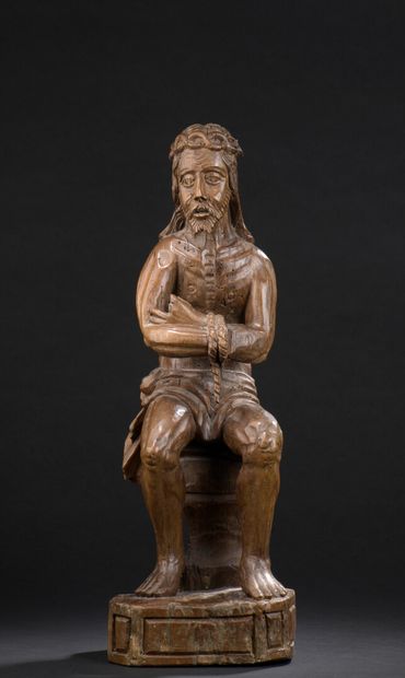 null 
*Christ with ties in carved wood. The seated Christ, his head girded with a...