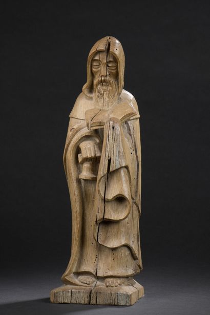 null 
*Saint Anthony in carved oak, flat back. The saint is holding a book and a...