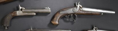 null A pistol with percussion, double barrel in table

 and another one with pin,...