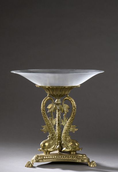 null Important presentation cup in silvered bronze, the shaft formed by three dolphins,...