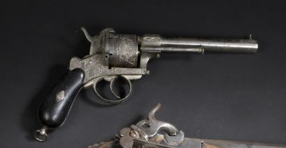 null Lefaucheux system revolver, nickel-plated steel frame, engraved with foliage;...