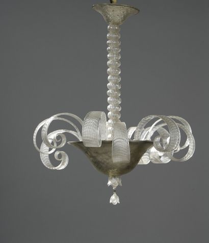 null Chandelier in Murano glass with 12 volutes, cup in eglomerate glass.

H: 70,...