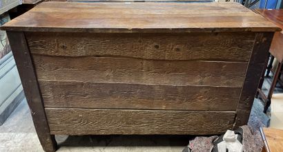 null Molded walnut chest of drawers, the front opening to three drawers, the top...