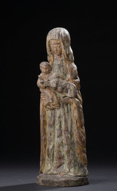 null 
*Virgin and Child in carved wood with remains of polychromy. Standing, she...