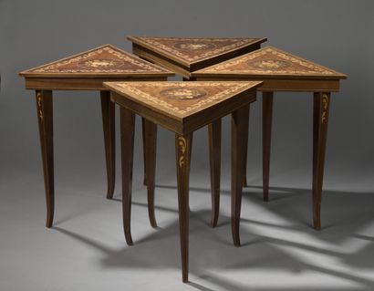 null Four triangular tables, each revealing a music box, opening to a flap, forming...