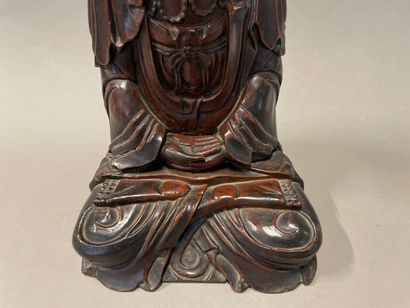 null Bodhisattva in patinated wood and red lacquered representing a monk in meditation.

China,...