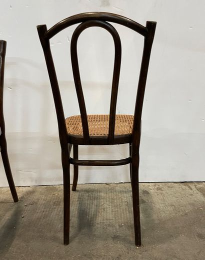 null THONET Wien 

Eight bistro chairs in curved stained beech, cane seat, label...