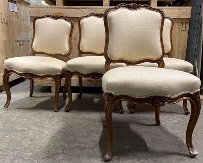 null Suite of four chairs in molded wood and carved with flowers, with back to the...