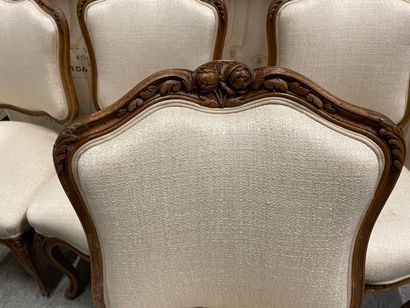 null Suite of four chairs in molded wood and carved with flowers, with back to the...