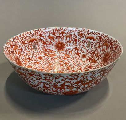 null Porcelain bowl decorated with coral and Chinese characters. 

Modern China....