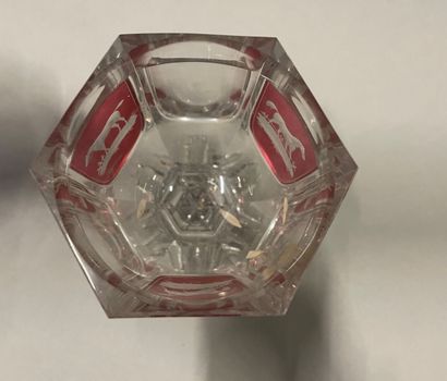 null Hexagonal footed glass decorated with horses on a red background, the base of...