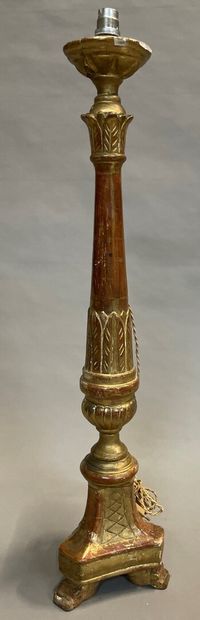 null Wooden candle stick, gilded and carved with leaves, mounted as a lamp.

H. 73...