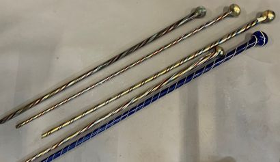 null Five polychrome and gold spun glass canes with rounded knobs.

Venice, early...
