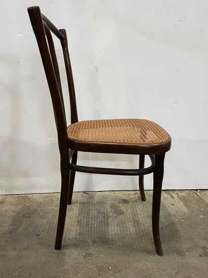 null THONET Wien 

Eight bistro chairs in curved stained beech, cane seat, label...