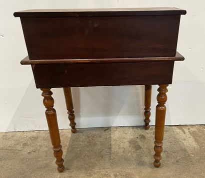 null Mahogany veneered child's desk with five drawers, one of which is simulated...