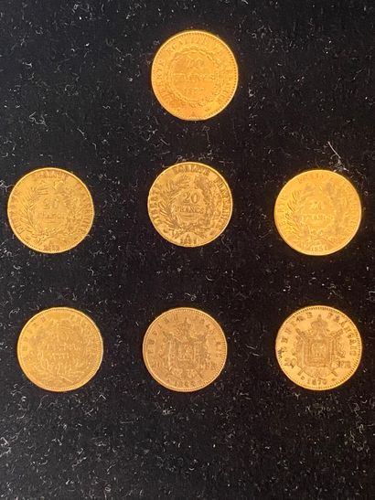 null 
FRANCE 




7 monnaies de 20 francs en or, Génie de la République rédigeant...