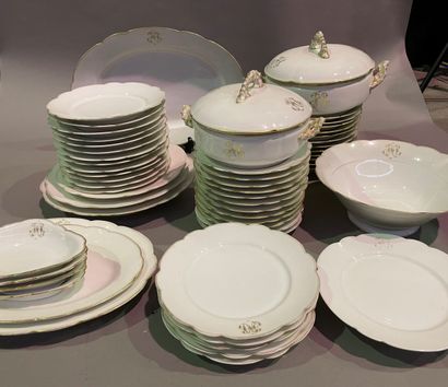 null Porcelain dinner service with scrolled decoration and gilded fillet, numbered,...