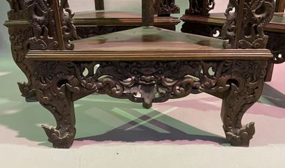 null Three carved exotic wood corner tables, decorated with dragons looking for the...