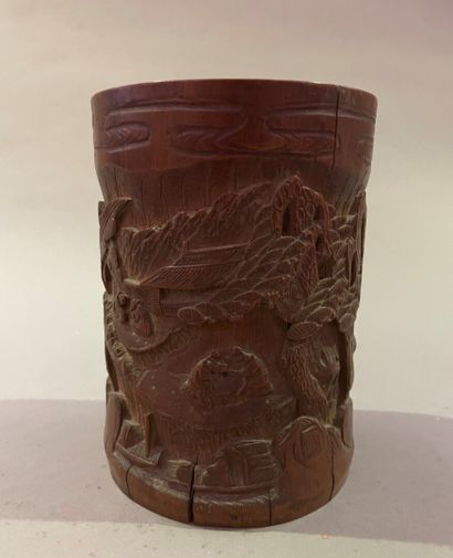 null Carved bamboo brush pot, decorated with an animated landscape of characters

China,...