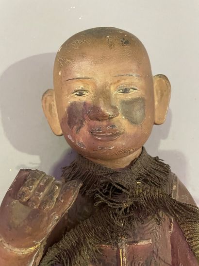 null Poussah in natural lacquered wood. 

Vietnam, late 19th century. 

Height :...