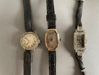 null Lot of three ladies' wrist watches:

- A round yellow gold case and rose-cut...