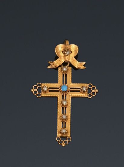 Yellow gold cross pendant decorated with...