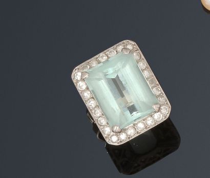 Ring with a rectangular aquamarine cut in...