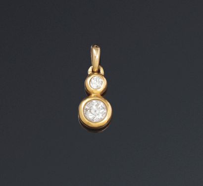 Pendant with two old cut diamonds set on...