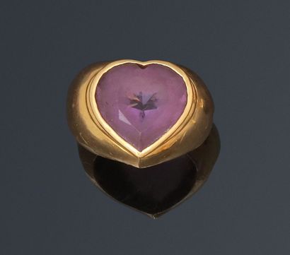 null Ring set with a heart-shaped amethyst (slight chips) on a yellow gold band.

Weight...